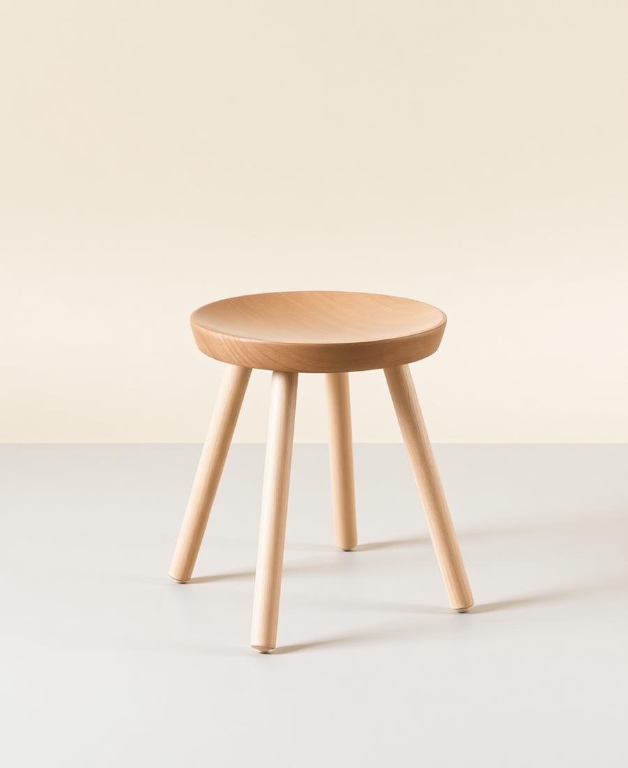Small three-legged plywood stool